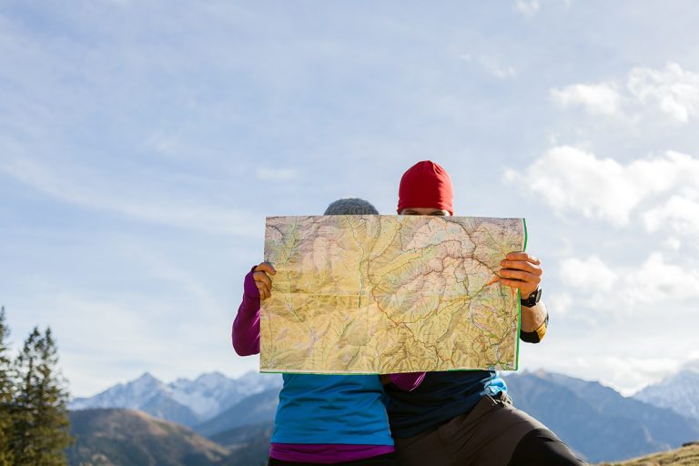 Two people looking at a map