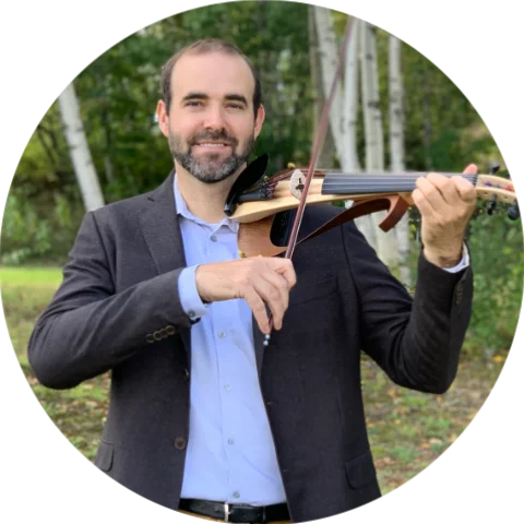 Alan climbing ice wall